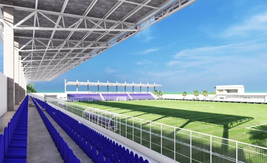 Projeto arquitetônico do Novo Estádio José Ibrahim Nicolau, em Muniz Freire, com arquibancadas cobertas, assentos em azul, gramado revitalizado e estrutura moderna prevista no investimento de R$ 9,7 milhões.